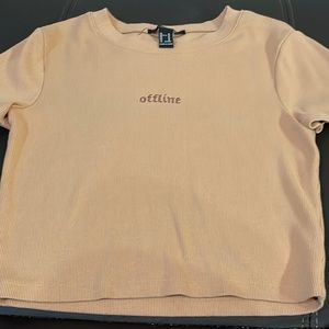 short sleeve shirt that says “offline” in the middle